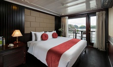 A bed or beds in a room at Halong Majestic Legend Cruise