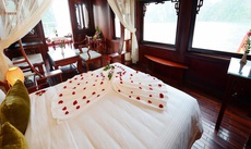 A bed or beds in a room at Royal Palace Cruise